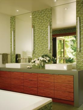 A consistent use of teak and tile in complementary earth tones pulls the room together in a soothingly organic way.