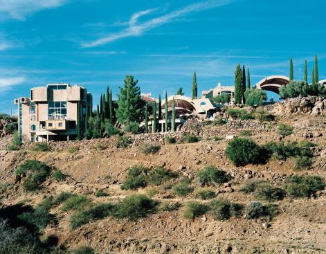 The Arcosanti complex exemplifies Soleri’s concept of Arcology, or the fusion of architecture and ecology. It sits on an 860-acre property, adjacent to the 71,000-acre Agua Fria National Monument. Many of Arcosanti’s 50 or so employees and volunteers live on site full-time, giving tours and workshops, constructing new buildings, and fabricating sculptural bronze and ceramic bells that are a major source of revenue.