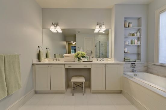 Clean Dream Light colors can be hard to keep clean, but not in this master bath. "Large slabs of Corian in the shower stall and tub surround create a streamlined look and are also easier to clean and care for," Martha Stewart explains, because they use less grout. Memoirs bath fixtures by Kohler complement the room's clean lines.