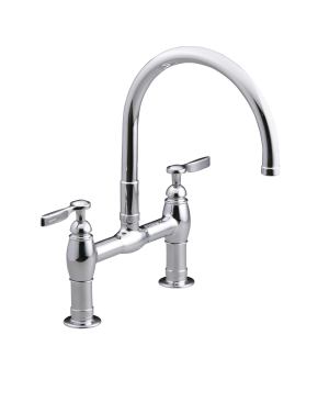 Transition Team To blend with the home's style, the team selected a variety of transitional-styled products from Kohler. The Parq deck-mount kitchen faucet is a new interpretation of a classic design; it goes well with the Dickenson cast-iron apron-front sink. www.kohler.com.