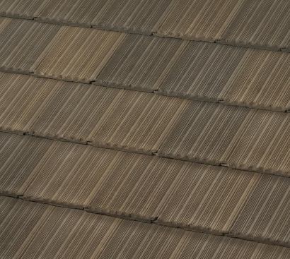 Proper Topper The house is topped with Saxony 900 concrete shake roofing from MonierLifetile. Each tile measures 17 inches by 13 inches and is made from sand, cement, and water. The roofing comes in various colors, but the team chose charcoal brown blend. www.monierlifetile.com.