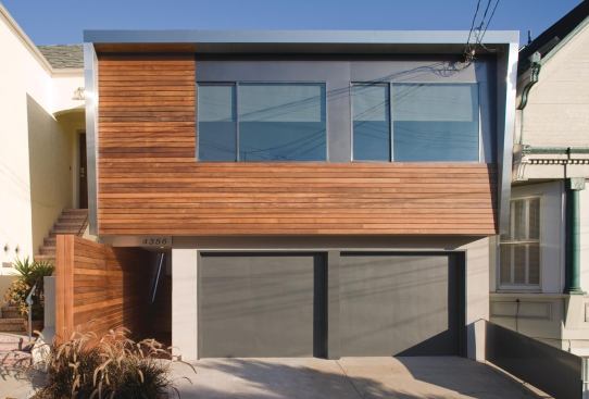A new ipe skin redefines the front elevation (shown) as well as the back of the house.   residential architect, March-April 2010  Choy Residence, San Francisco  Terry & Terry, San Francisco