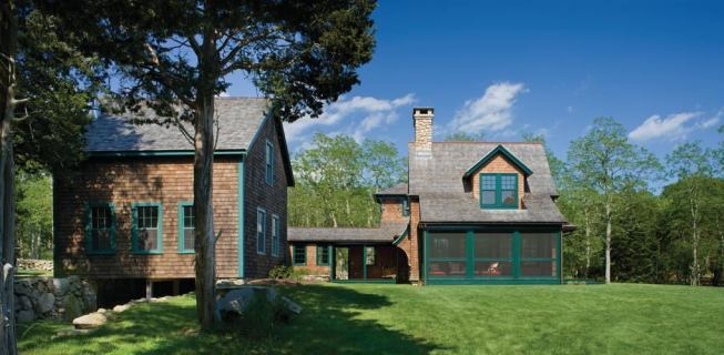 The space between the house and the sheds becomes a courtyard. 