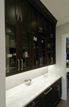 Ample counter space is one way to make a rowhouse kitchen feel big. 