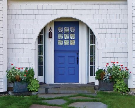 The front door is an ideal place to get a little daring with color, hardware, detailing, and one-off design touches that make a home feel  truly original.  The house that this door belongs to is new construction, but classic proportions, salvage elements, and vintage-style details—provided they’re done really well—make it look and feel like it’s been around for awhile. 


Firefly Hill, Buchanan, Mich. Architect: Sullivan Goulette & Wilson, Chicago; Builder: Jacob Construction, Berrien Springs, Mich.