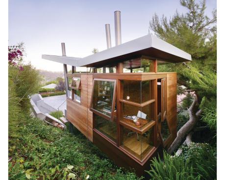 The tree house’s design elements were drawn from earlier house plans that architect Christopher Kempel had drawn up for the artist and her husband. That house never got built, but its spirit and details were able to be realized on a smaller scale that was just as meaningful, with the tree house.  