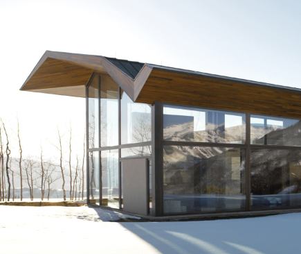 The copper roof is a mere 6 inches thick, but its folded-plate design allows long spans and eliminates the need for columns.