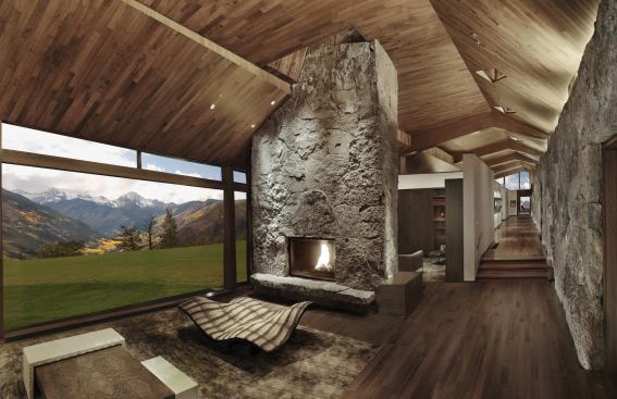 Black walnut and travertine dominate the interior, as does a moss-rock wall that bisects the home.