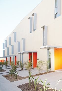 Designed for forward-thinking first-time buyers, The Duke offers sustainable materials, metal cladding, and open-plan living spaces. Pedestrian and vehicle circulation are separated to promote social interaction.