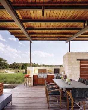 The thick masonry walls are oriented to deflect winter’s northwest winds and collect prevailing summertime breezes.