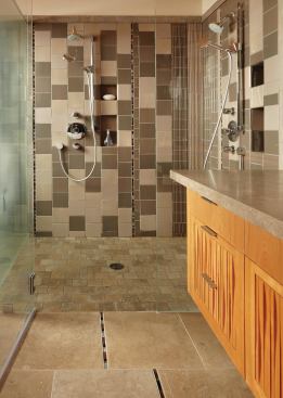 With its new gabled fir ceiling, cherry cabinets, and limestone floors and countertop, the bath plays off its natural setting.

