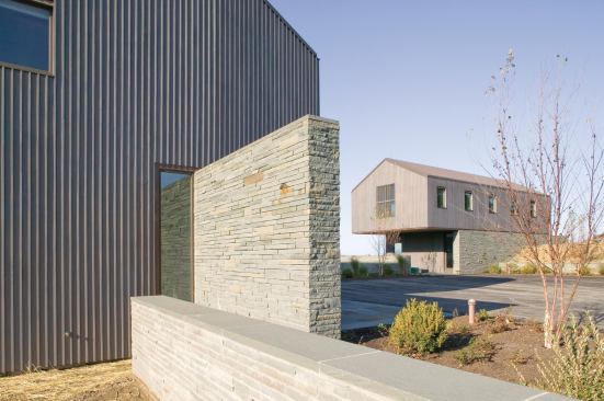 Boxer and his crew are known for finessing tricky details such as the bluestone walls and textured wood siding at this Austerlitz, N.Y., house, guesthouse, and garage.