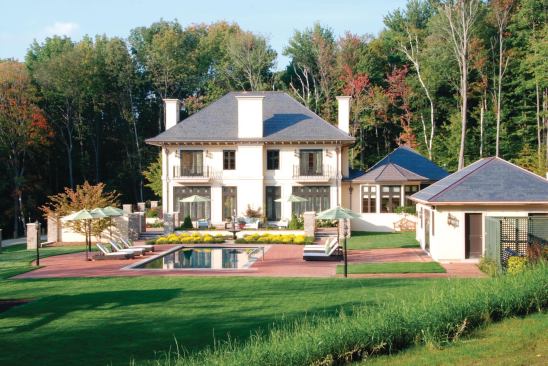 Lou Boxer's company builds both modern and traditional homes, such as this classically styled residence in West Stockbridge, Mass.