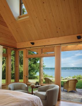 Abundant FSC-certified Loewen windows fill the home with light and offer pristine views of Washington's Puget Sound and Mt. Ranier beyond.