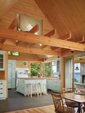 The bright, open kitchen includes Paperstone countertops, crafted with 100% post-consumer recycled paper, GE and Miele Energy Star-rated appliances, and Pacific Crest cabinetry made with EPP-certified particleboard.