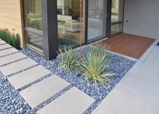 Deep, cantilevered overhangs manage sunlight and contribute to the home's crisp outlines. Landscape Architect: Huettl Landscape Architecture, Walnut Creek, Calif.; Architect: Swatt|Miers, Emeryville, Calif., Builder: K. Daniel Kenny & Company, San Ramon, Calif.