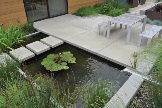 A weather-based water controller  mounted in the sun sends signals about how intensively to water. Landscape Architect: Huettl Landscape Architecture, Walnut Creek, Calif.; Architect: Swatt|Miers, Emeryville, Calif., Builder: K. Daniel Kenny & Company, San Ramon, Calif.