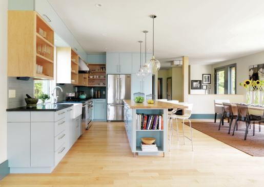 Energy-efficient radiant heat warms the Vermont maple floors on the home's first level.
