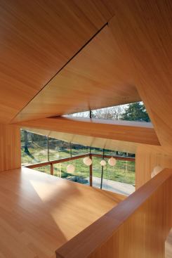 View from sleeping area to living area below