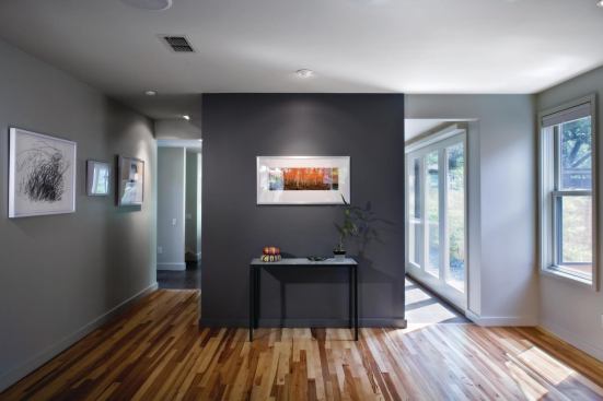 Cool gray hues give the living/dining areas in the original house a quiet and relaxing feel.