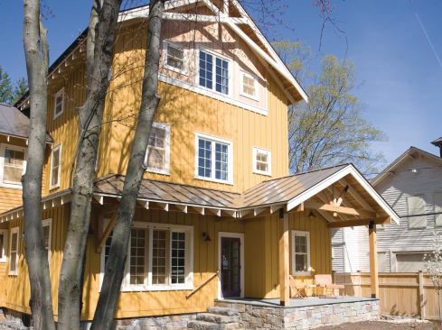A traditional barn-like exterior combines with an extensive list of sustainability-boosting details, including reclaimed timbers; locally sourced trim, ceilings, flooring, and pavers; and solar electric and water. The efforts paid off with a HERS rating of 27 and certifications to LEED-Platinum and NGBS-Emerald.
