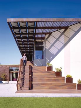 The home is organized around a series of courtyards and outdoor spaces in a design that, like many in Southern California, takes advantage of the climate and blurs the line between inside and outside living.