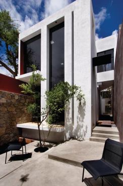 Soaring 

expanses of glass tie rooms to the sun-filled terraces. 

