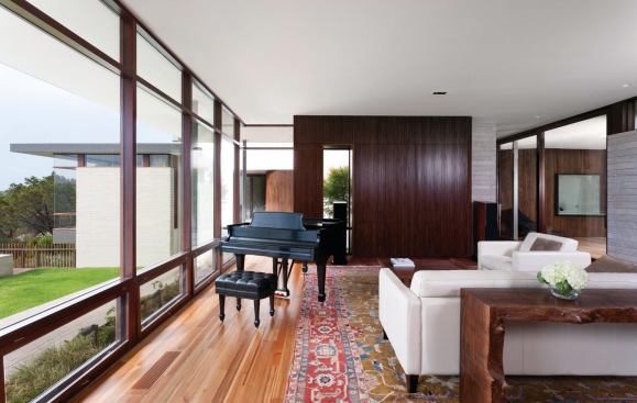 It adds shape to the home’s open plan layout, making the spaces feel cozier than they otherwise might. 