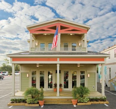 Sea Breeze Cottage has a 15 SEER (seasonal energy efficiency ratio) heat pump that heats and cools through air ducts sealed to reduce leakage. PV cells were integrated into asphalt roof shingles. Direct-vent fireplaces cut drafts and heat loss. Almost 30 feet wide, the beach cottage design features a front porch, peaked roof, and is designed for good cross ventilation. 