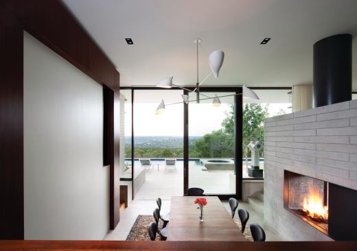 The home’s rear elevation looks out onto Austin’s Bright Leaf Nature Preserve. 