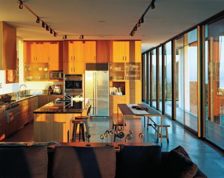 A deck extends the kitchen outdoors.

