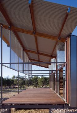 2007 rada  Freezer Panel Walkout, Eulogy, Texas  Merit Award/Renovation  Shipley Architects, Dallas   Oversized, perforated-metal panels act as sunscreens for this Texas master bedroom porch by Shipley Architects.