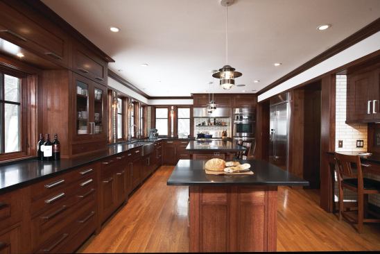 Rift-sawn white oak cabinetry echoes work found in the original Arts & Crafts house.