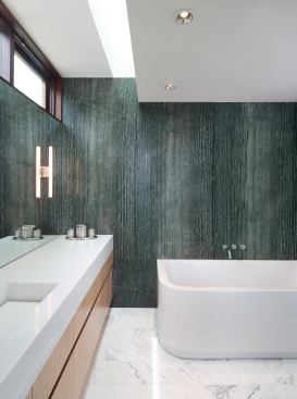 The master bath, which won a special focus award, includes a wall of Kenyan black marble. 