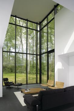 The ground floor features dark radiant-heated Ardex expoxy floors.

