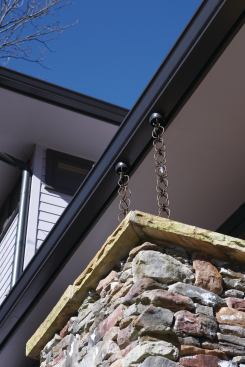 Cisterns

Three cisterns around the exterior collectively store up to 600 gallons of rainwater from the roof. The cistern on the front of the house is cleverly hidden within a vertical column and is fed by a rain chain, providing a striking aesthetic detail. The cisterns provide up to 20 psi of pressure when full.

Siding

The CertainTeed WeatherBoards fiber-cement siding contains 50% recycled content in the form of fly ash leftover from power plants, and the manufacturer obtains the majority of the material’s wood pulp from sustainably managed forests. The siding is available in a range of styles, including cedar lap, shakes, half-rounds, and vertical panels. 800.233.8990. www.certainteed.com.

