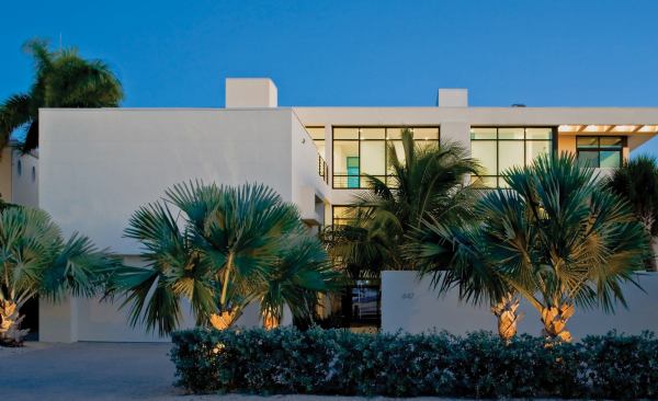 residential architect, july 2007  sarasota serene  guy peterson, office for architecture   Sarasota, Fla.-based architect, Guy Peterson uses a classic vocabulary of concrete and steel construction, floating overhangs that provide passive heating and cooling, and direct indoor-outdoor relationships that suit this near-tropical climate.&nbsp; Building on barrier islands or seaward of Florida's Coastal Construction Control Line adds another layer of design constraints. For example, homes must be built above the wave crest of a 100-year storm, which can be 19 feet above sea level in some zones, and must limit light emissions and glare to protect nesting sea turtles. The architect uses those contraints to make his designs bold, but fitting their setting. “Architecture should make you think about your environment,” says Peterson. “I'd rather have someone not like my work than not notice it.”