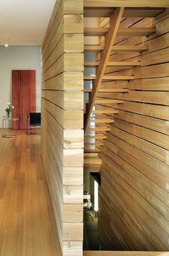 For added warmth, architect Randy Brown used salvaged cedar fencing for wall panels and other trimwork.

