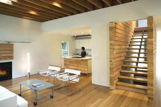 The home's master bedroom and bath are on the first floor along with the kitchen and living room area.

