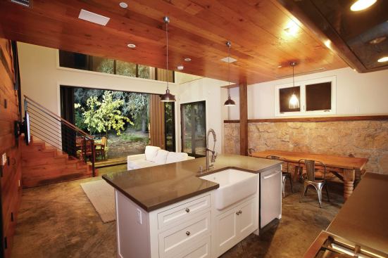 Structural posts have been added on the barn's interio, making possible a second-floor with bedrooms and a sitting area.