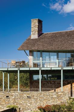 Jake Talbot and his crew worked on this shingle-and-stone residence by Estes/Twombly Architects.