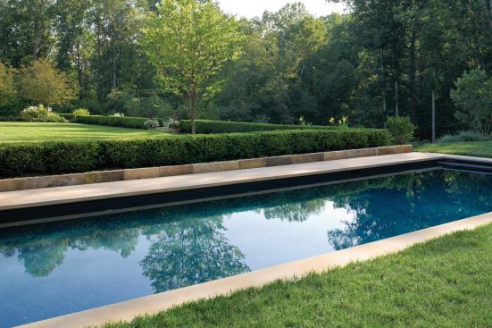 Boxwood hedges framing the east and west lawns lend tidy year-round structure.

