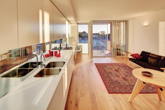 Apartment units meet strict mandatory standards for natural light and cross-ventilation.