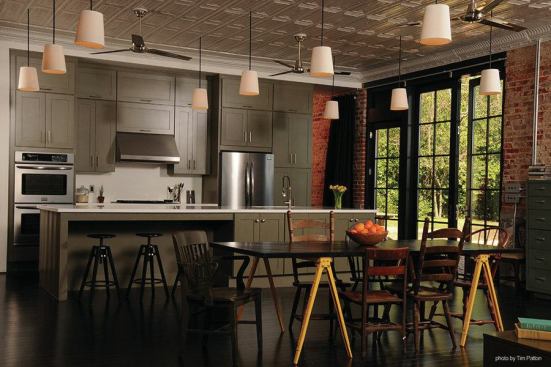 This contemporary kitchen is housed in a 1920s warehouse building. The structure has colorful history throughout the years as a pool hall, night club, grocery store, and even a church. 