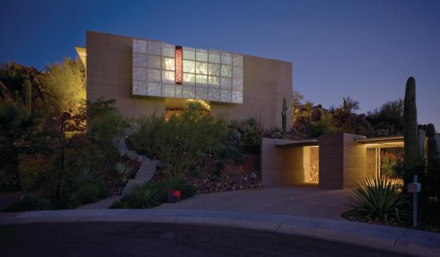 The Farrell Residence preserves the topography of its steep site by splitting off an elegant carport at street level.

Architect: The Construction Zone and Mike Rumpletin, Phoenix

