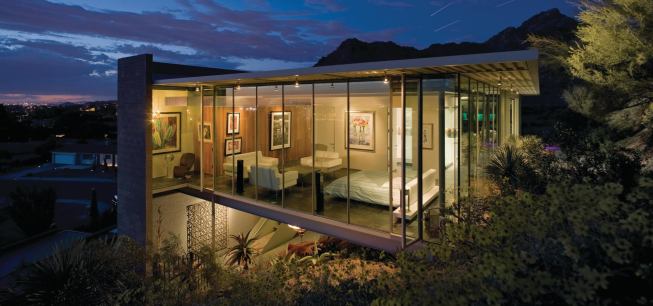 The Farrell Residence’s window walls provide city and mountain views while screening out neighboring houses.