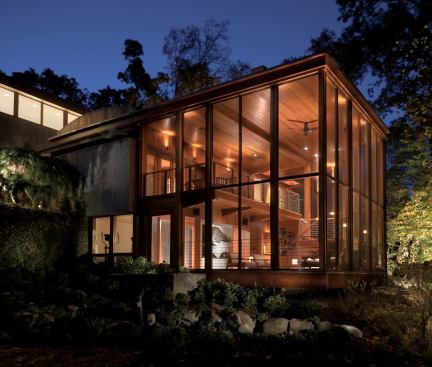 Moore returned to his first commission, Winding Lane, to add a Bali-inspired three-tier screened porch in 2006. Done in mahogany with a Sikkens boat finish, each deck level orients to a different view of the surrounding wetlands. As furnished rooms, the c
