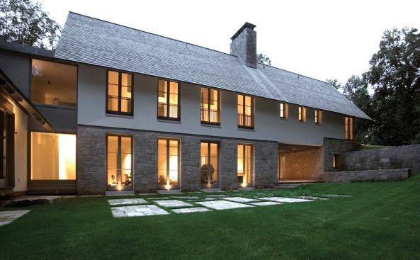 As austere as a New England farmhouse, this home on the Mianus River tracks the rise and fall of the land.