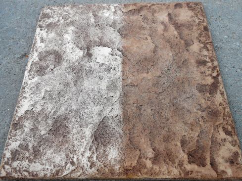 The left side of this sample was acid washed, the right side vigorously scrubbed with soap and water.