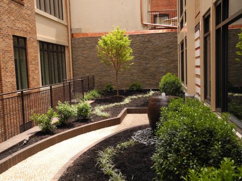 It was important to area preservation groups that the new building not overpower its environs. 